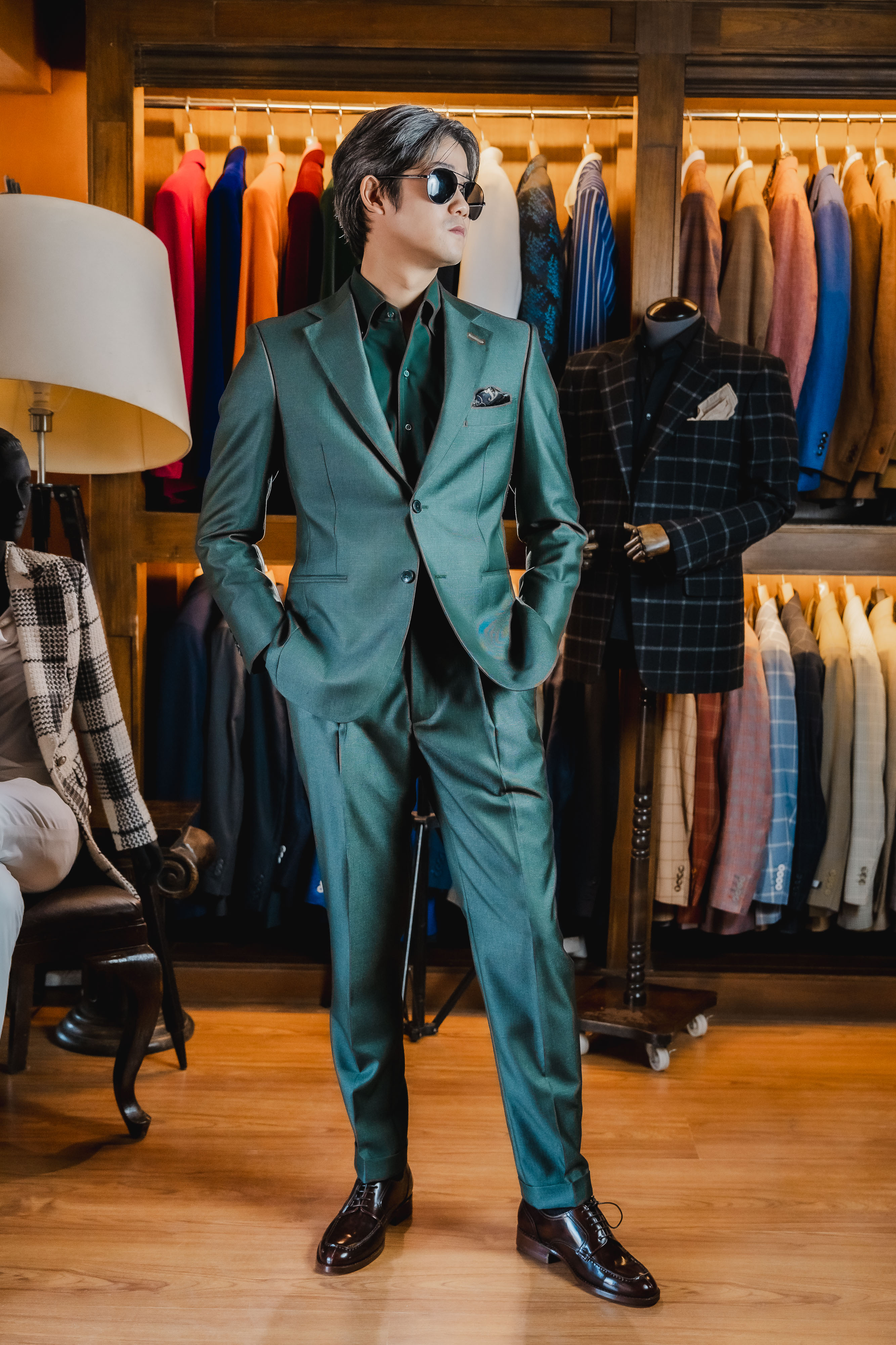 Green suit with sunglasses