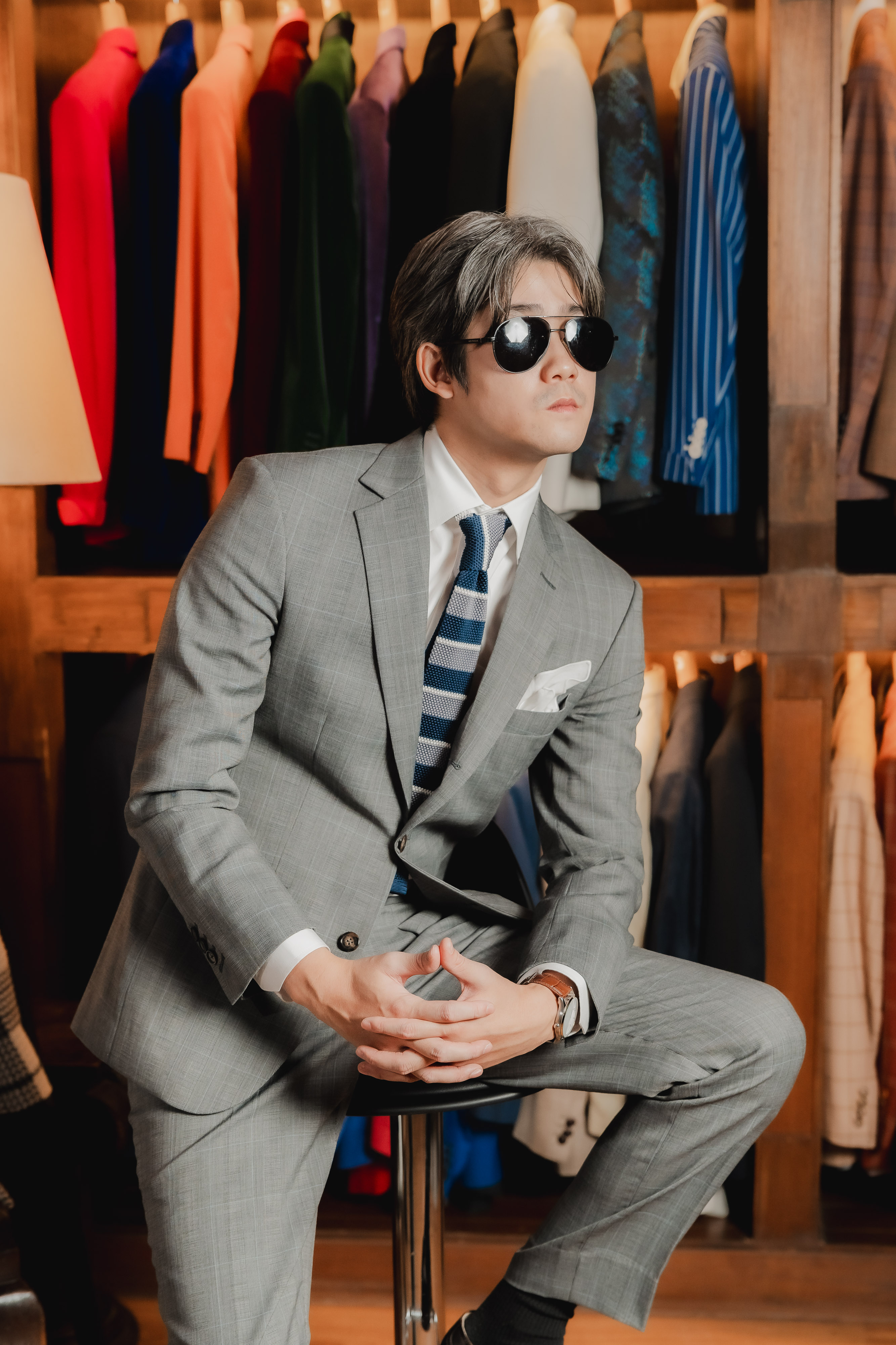 Grey suit with striped tie