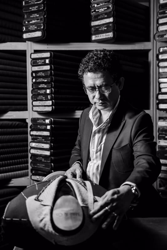 Mike inspecting garment